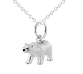 A sterling silver pendant in the shape of a polar bear, displayed on a silver chain against a white background.